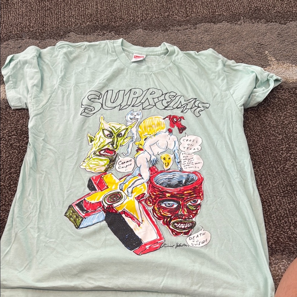 Supreme Mint Graphic Tee with Bold Artwork